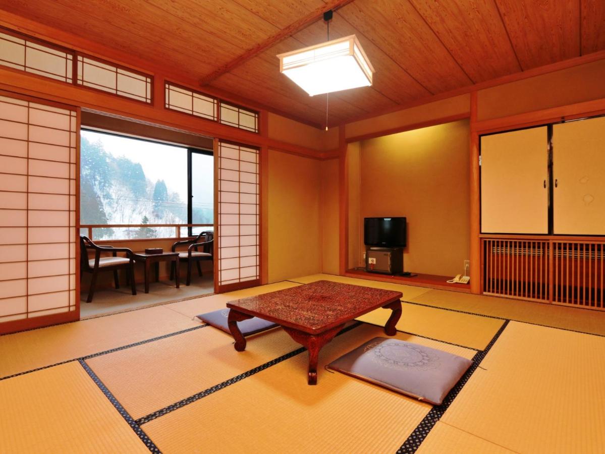 Quadruple Room with Shared Bathroom