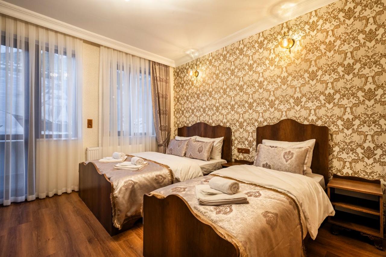 Dreibettzimmer mit Balkon