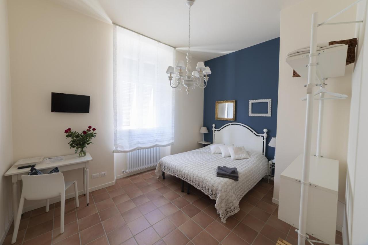 Camera Matrimoniale/Doppia con Letti Singoli con Letto Supplementare
