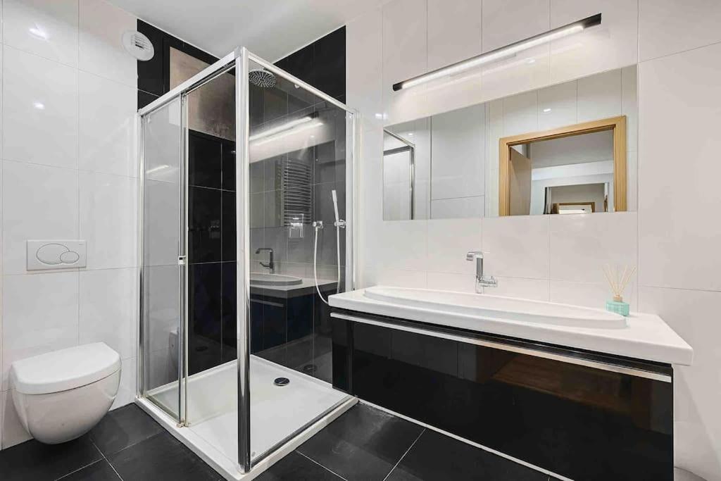 Komfortowy apartament z siłownią i sauną Revisit Apartment 11