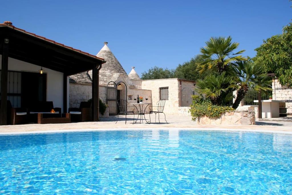Trullo Olivia con piscina riscaldata, natura e relax - B&B Martina Franca
