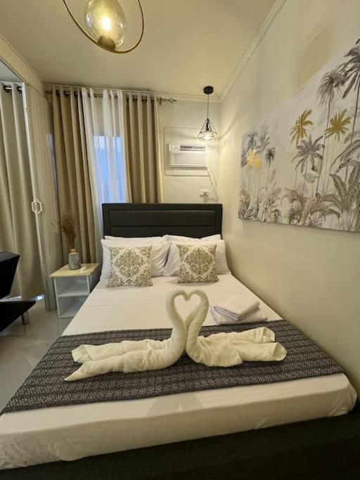 B&B Puerto Princesa City - 1 BedroomDeLuxe Condo w/Balcony, Pool & Gym - Bed and Breakfast Puerto Princesa City