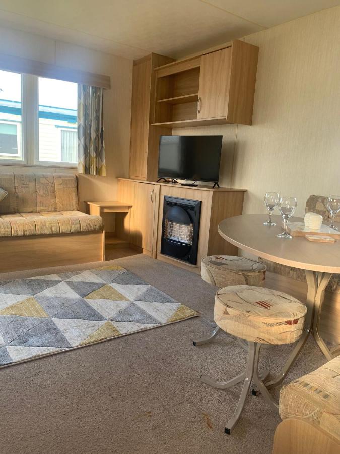 A14 is a 3 bedroom caravan on Whitehouse Leisure park with large decking - B&B