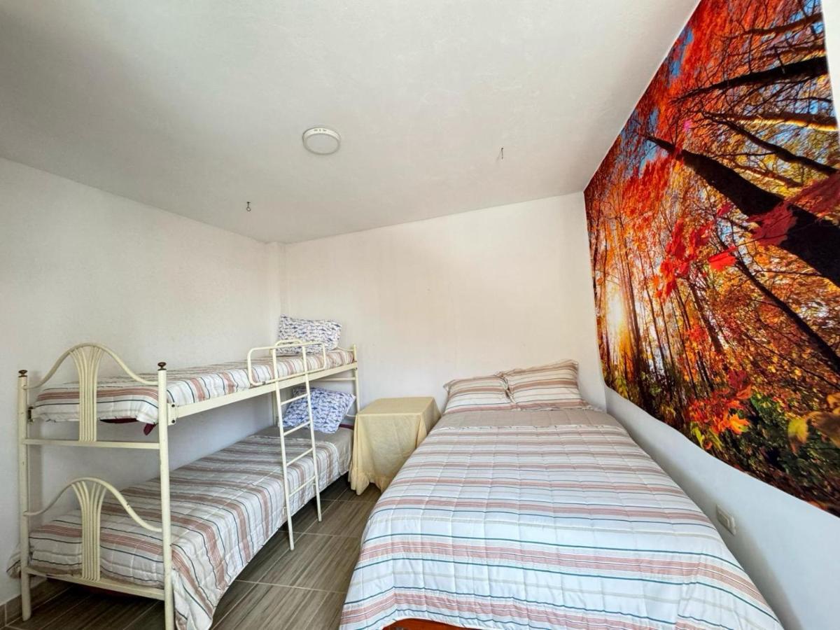 Chambre Triple avec Salle de Bains Commune