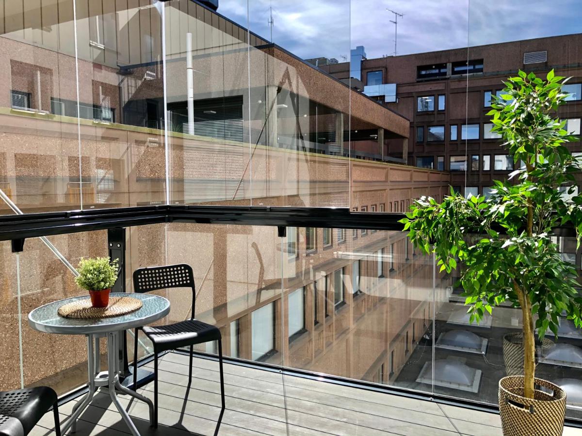 Kotimaailma Apartments - Moderni parvekkeellinen keskustakaksio - Rongankatu - Chambres d'hôtes Tampere
