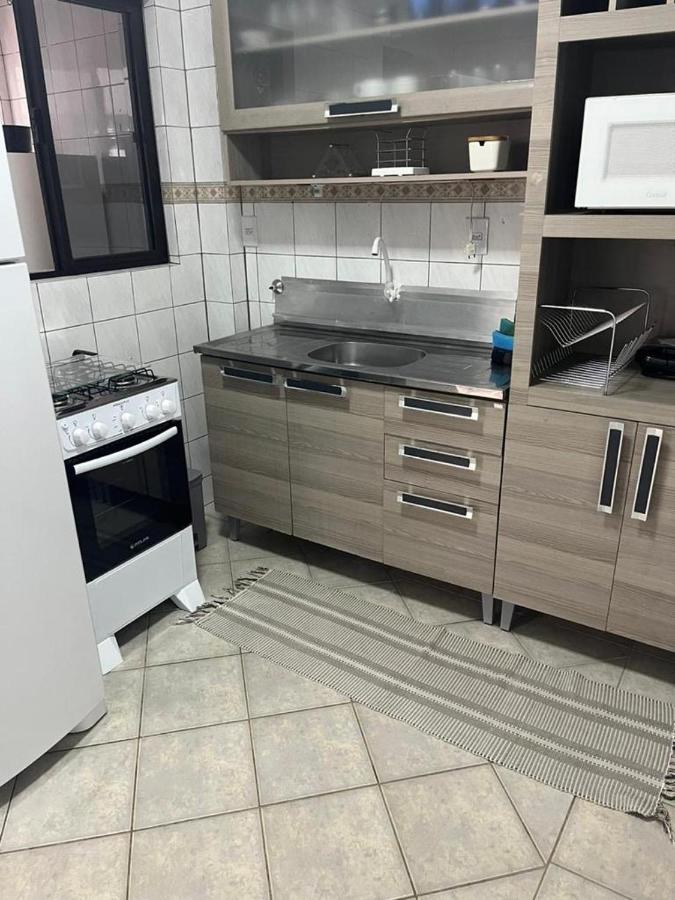 Apartamento na melhor localização da meia praia em itapema com garagem para camioneta suv - Chambres d'hôtes Itapema