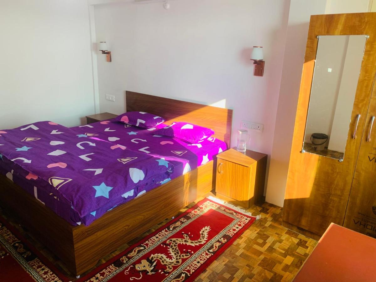 Chambre Double Deluxe (2 Adultes + 1 Enfant)