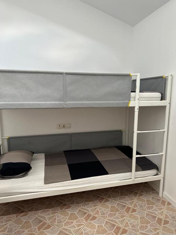 Chambre Quadruple avec Salle de Bains Commune