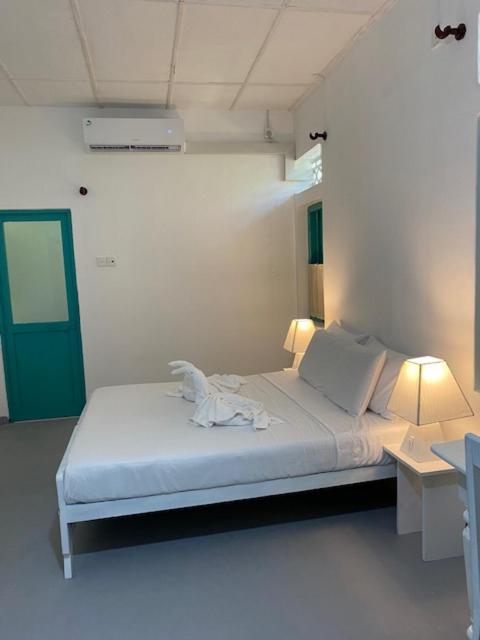 Chambre Double Deluxe (2 Adultes + 1 Enfant)