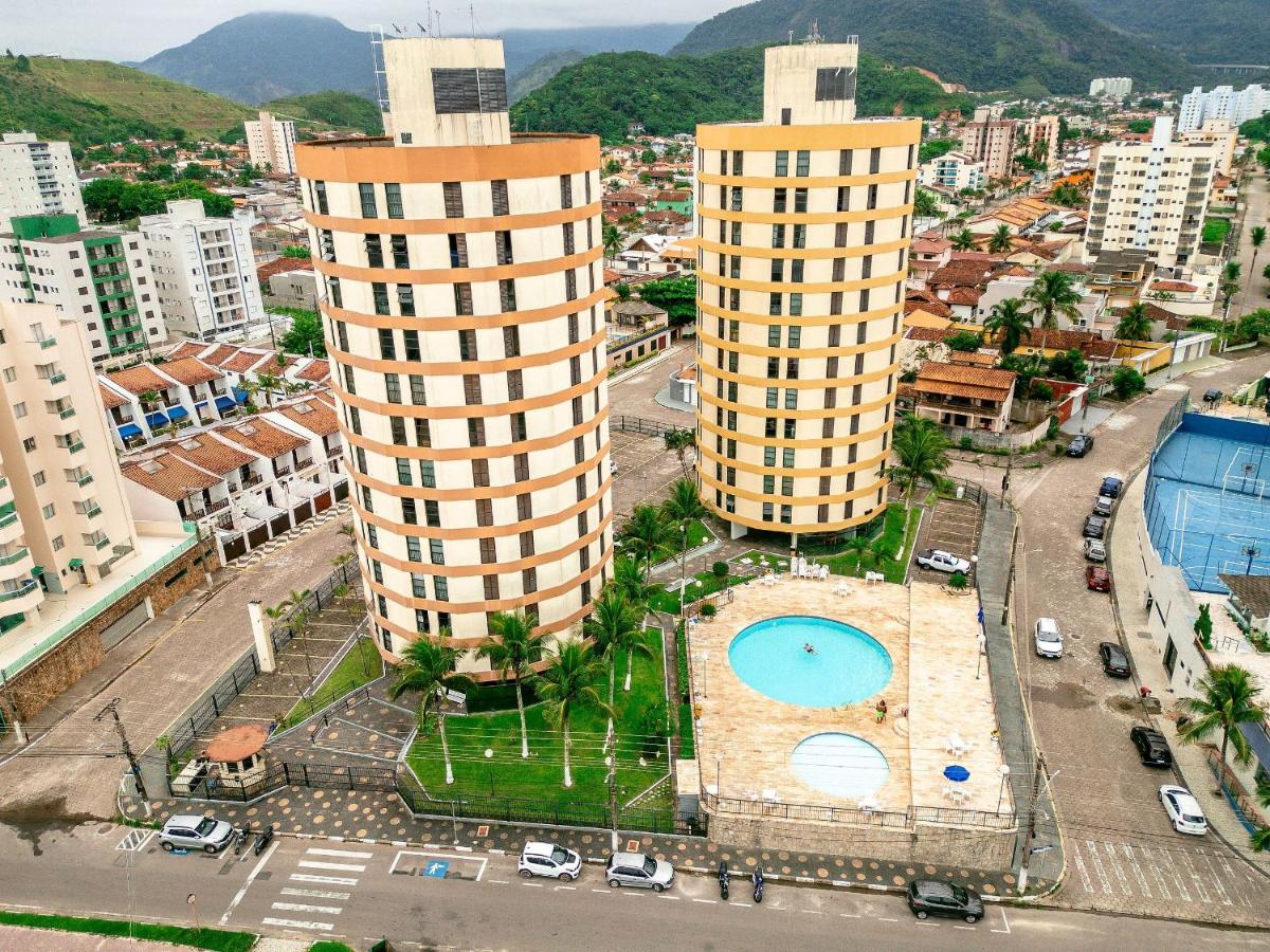 Apto p/4, garagem e piscina de frente para a praia - Ferienwohnung Caraguatatuba