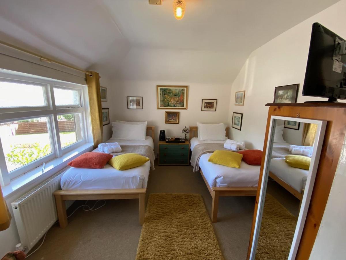 Twin room with private outside bathroom (only 1 meter opposite)