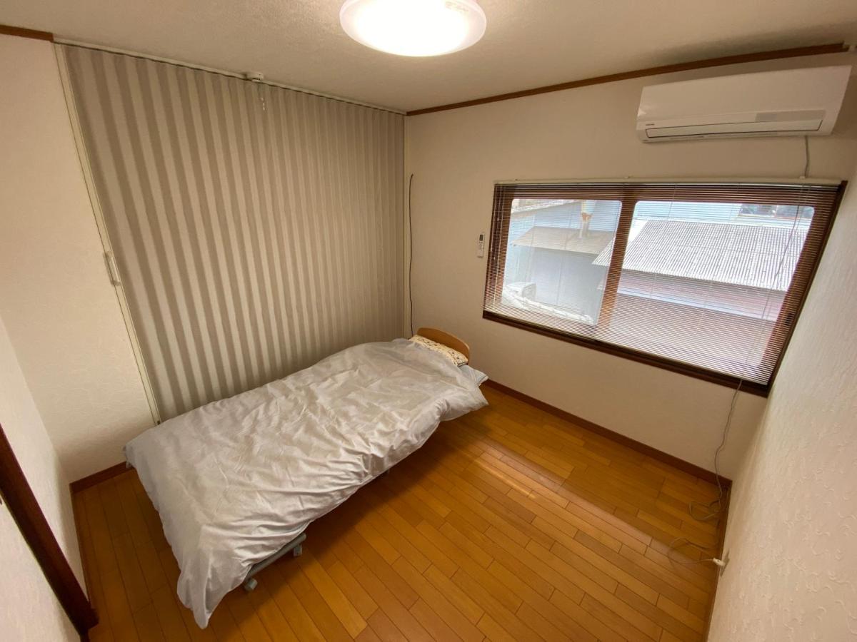Quadruple Room with Shared Bathroom