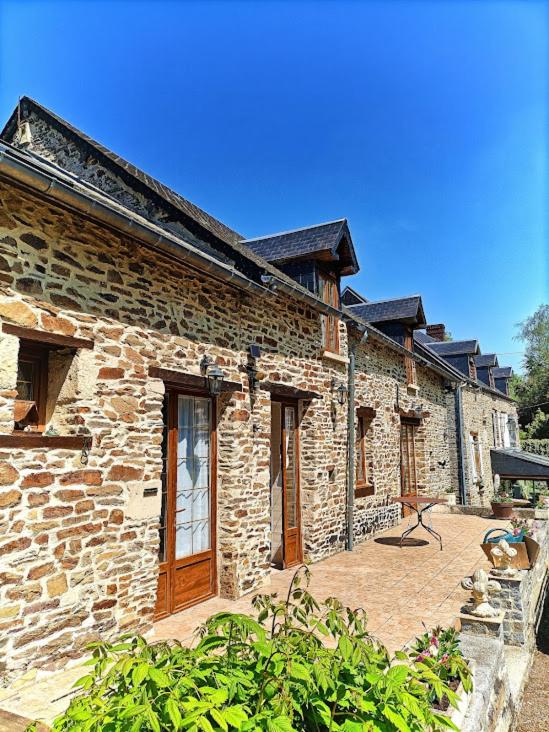Le Moulin de Benneville chambres d'hôtes, petit déjeuner compris - Ferienwohnung