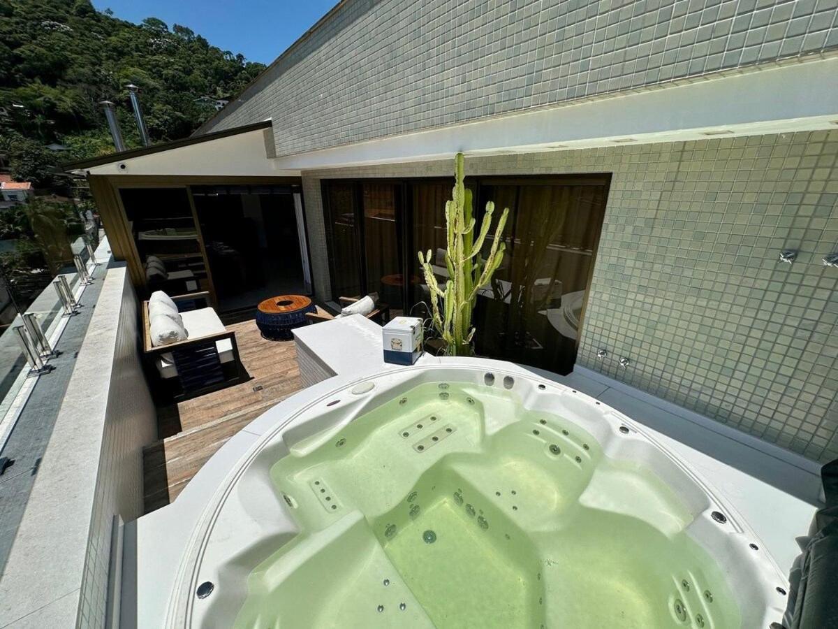 Cobertura com jacuzzi no Centro - Chambres d’hôtes