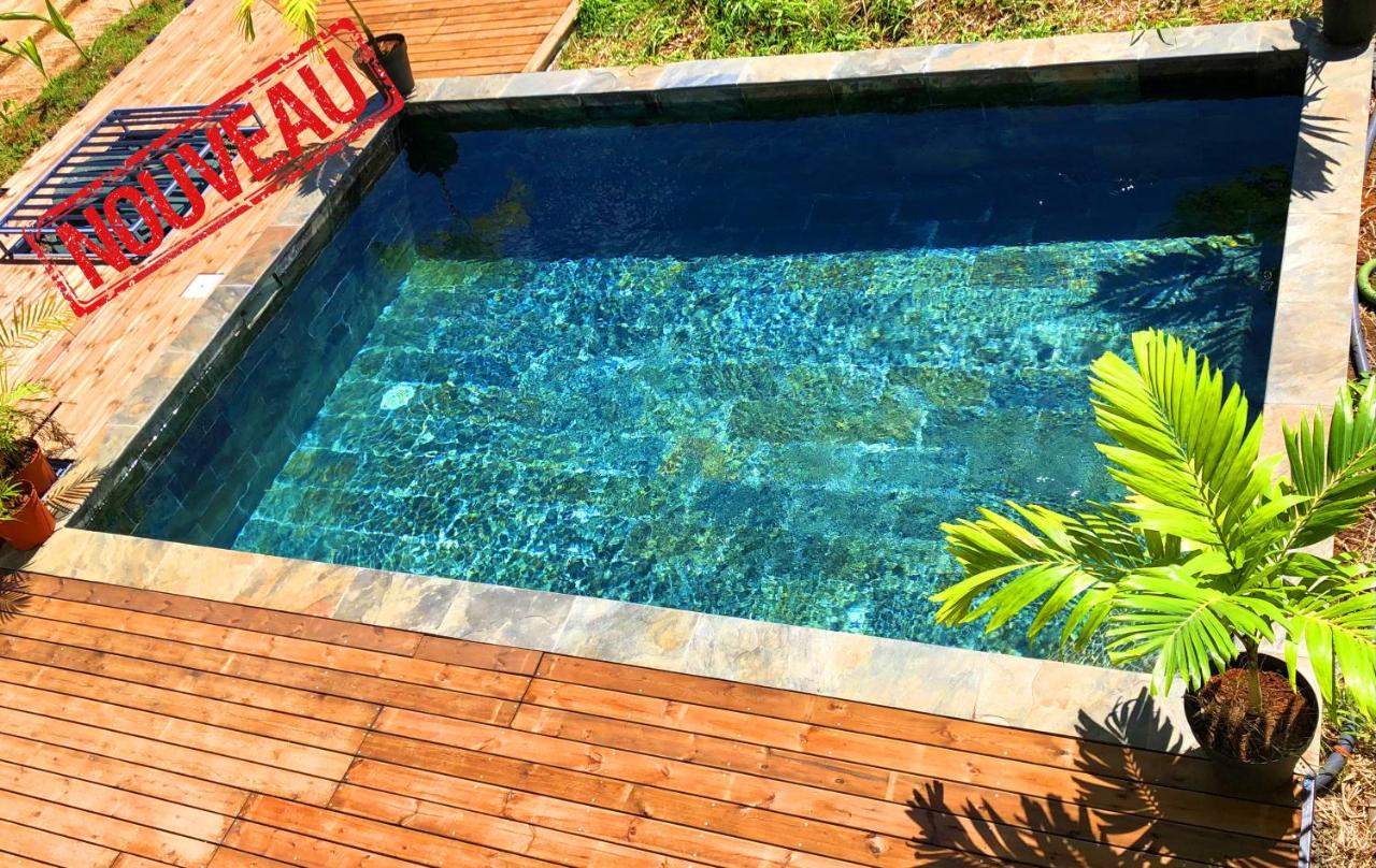 F3 Hibiscus - piscine chauffée - vue mer - 9 min de la plage - Ti Zwézo Paradi - B&B La Trinité