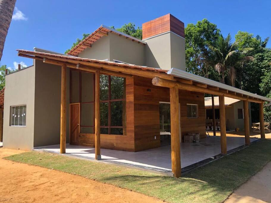 Belíssima casa no condomínio Mar Doce de Abrolhos - Ferienwohnung Caravelas