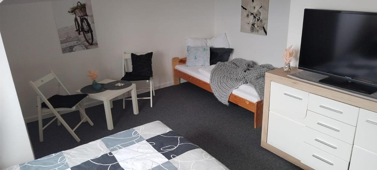 Dreibettzimmer mit Gartenblick