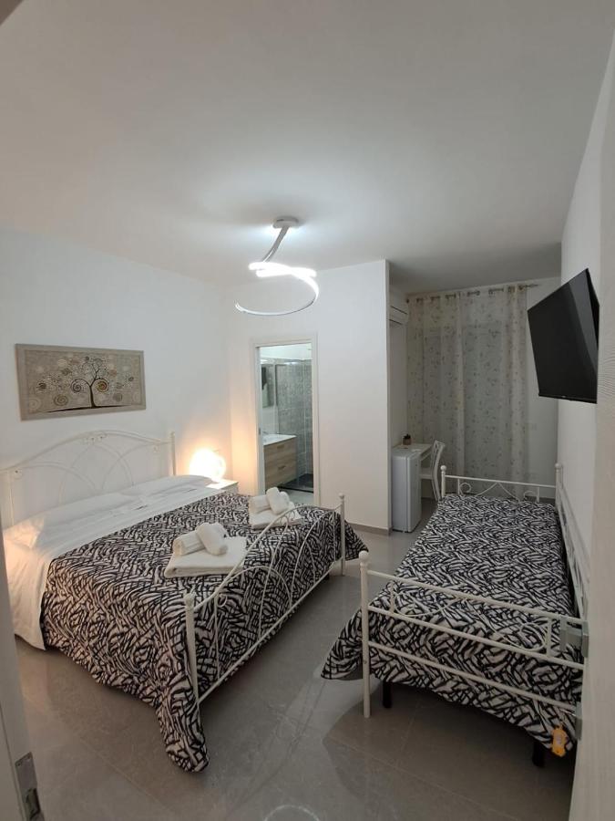 Dreibettzimmer mit Balkon