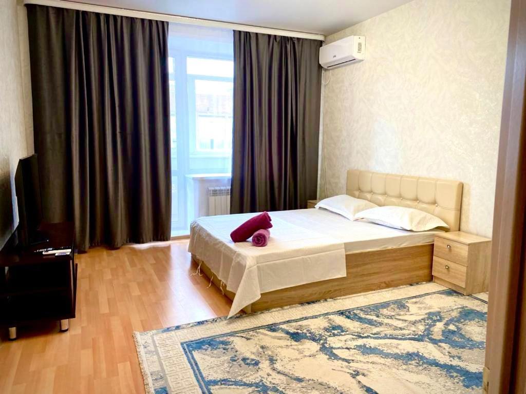 B&B Kostanaï - Леонида Беды 44, Большая 1 комнатная квартира в Jana Qala от компании Home Hotel - Bed and Breakfast Kostanaï