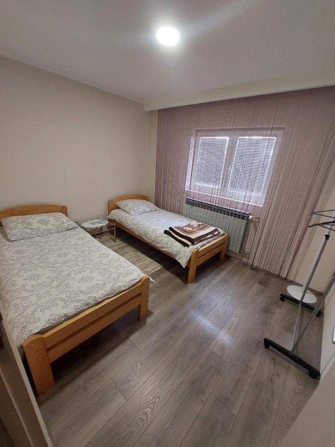 Tweepersoonskamer met 2 Aparte Bedden