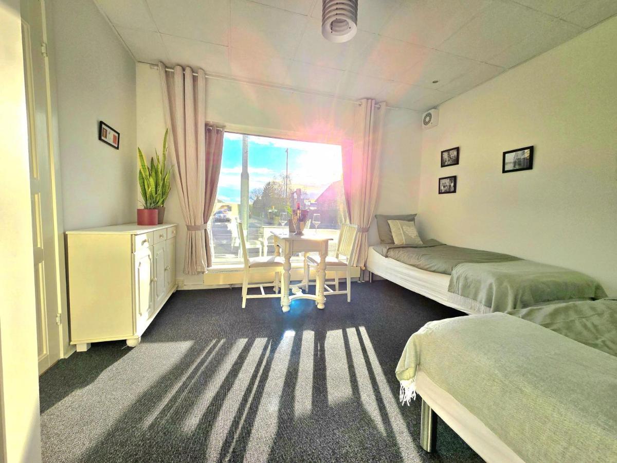 Tweepersoonskamer met 1 of 2 Bedden en Gedeelde Badkamer