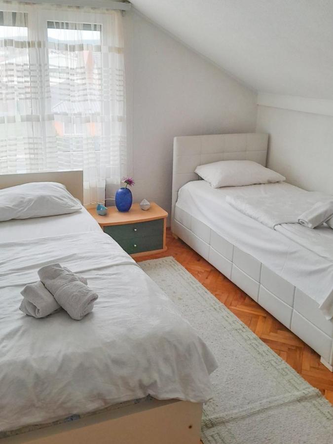 Camera Tripla Economy con Bagno in Comune