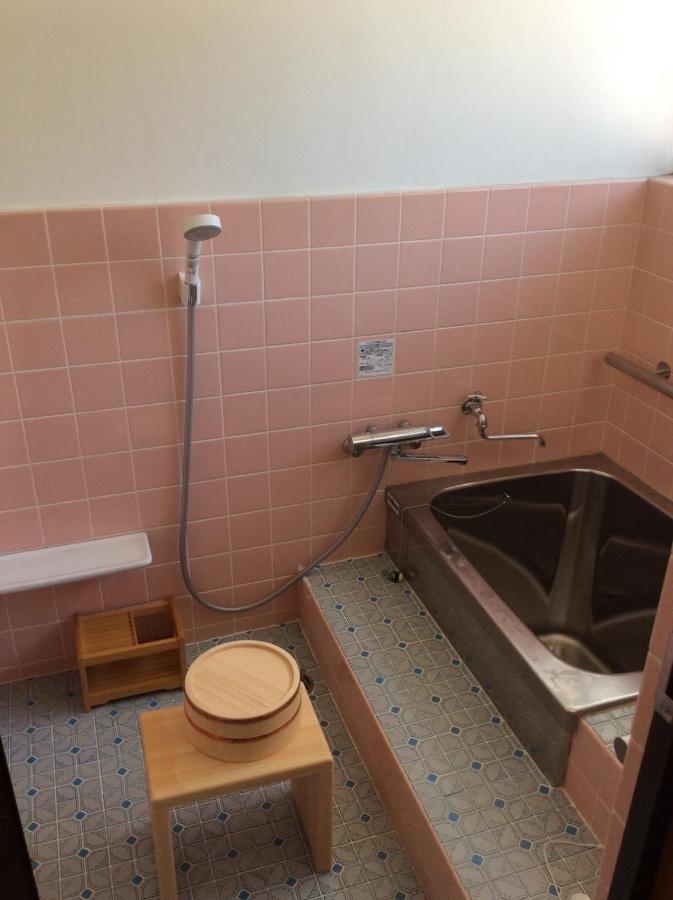 Economy Quadruple Room with Shared Bathroom