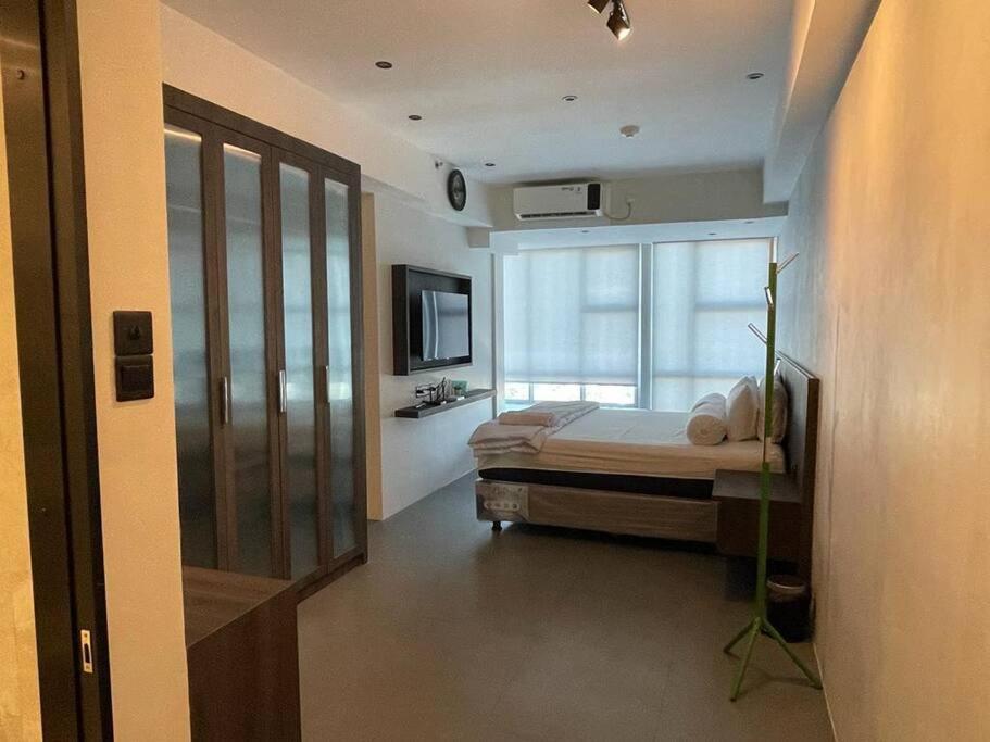 Benson Apartment Pakuwon Mansion 1 - Chambres d’hôtes