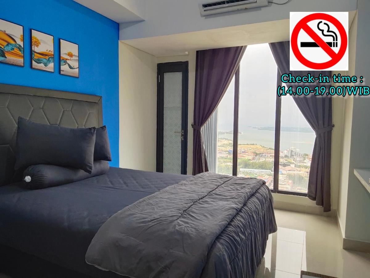 Comodo Apartemen Pollux Habibie Rooftop-SeaView - Bed and Breakfast