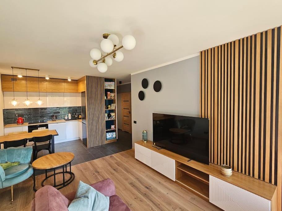 Faktura VAT Apartament przy Loftach u Scheiblera parking podziemny, Śniadaniownia - Ferienwohnung Łódź