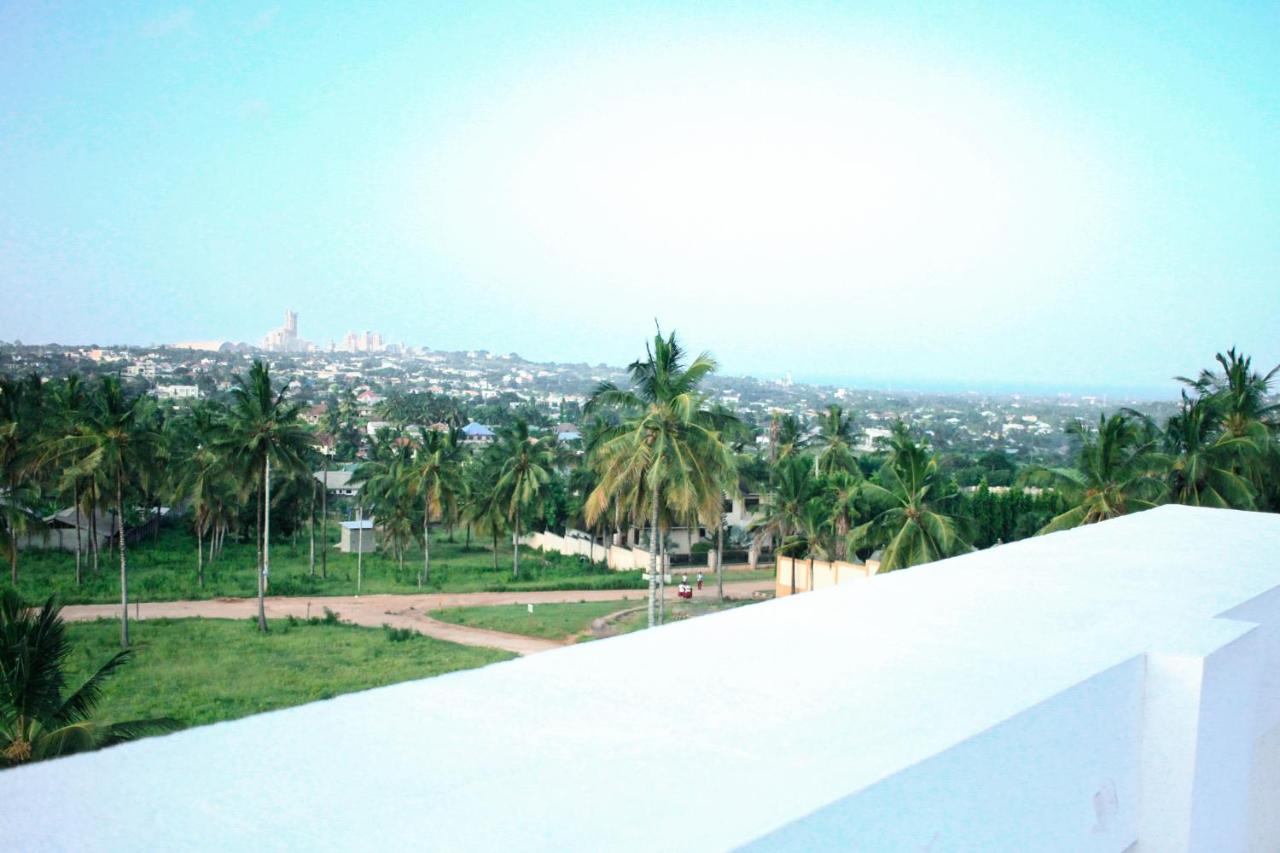 One-Bedroom Apartment with Balcony and City View