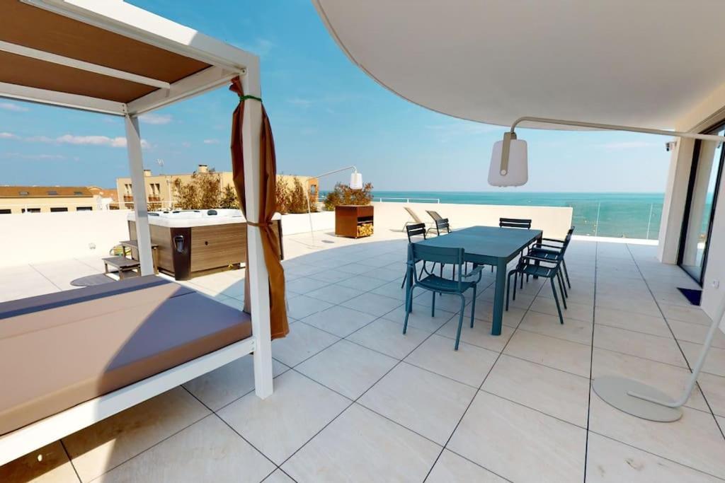 Three-Bedroom Apartment with Sea View