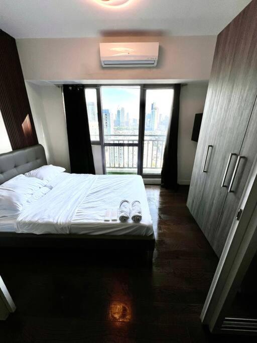 Acqua Private Residences - Livingstone Tower (Makati - Mandaluyong) - Chambres d’hôtes Manille