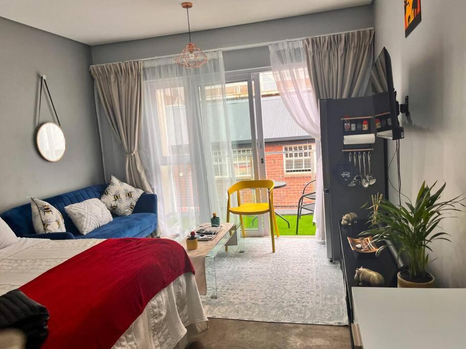 Cozy condo in the heart of Maboneng - Chambres d'hôtes Johannesbourg
