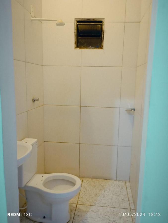 Casa kitnet Próx da Rodoviária c/ suite e ar condicionado entrada individual . Geladeira e cozinha básica. Garagem pra carro. - B&B Palmas