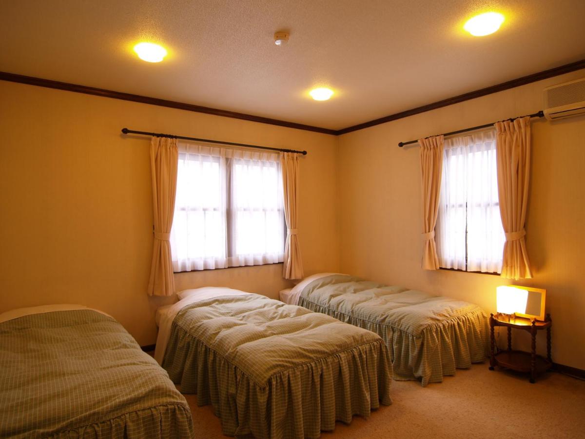 Chambre Triple avec Salle de Bains Commune