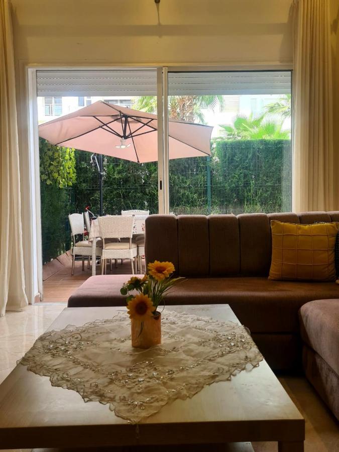 Appartement résidence kettani jardin privatif accès direct piscine et aire de jeu - Chambres d’hôtes Bouznika