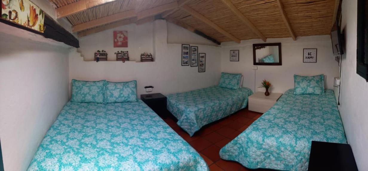 Economy Quadruple Room with Shared Bathroom