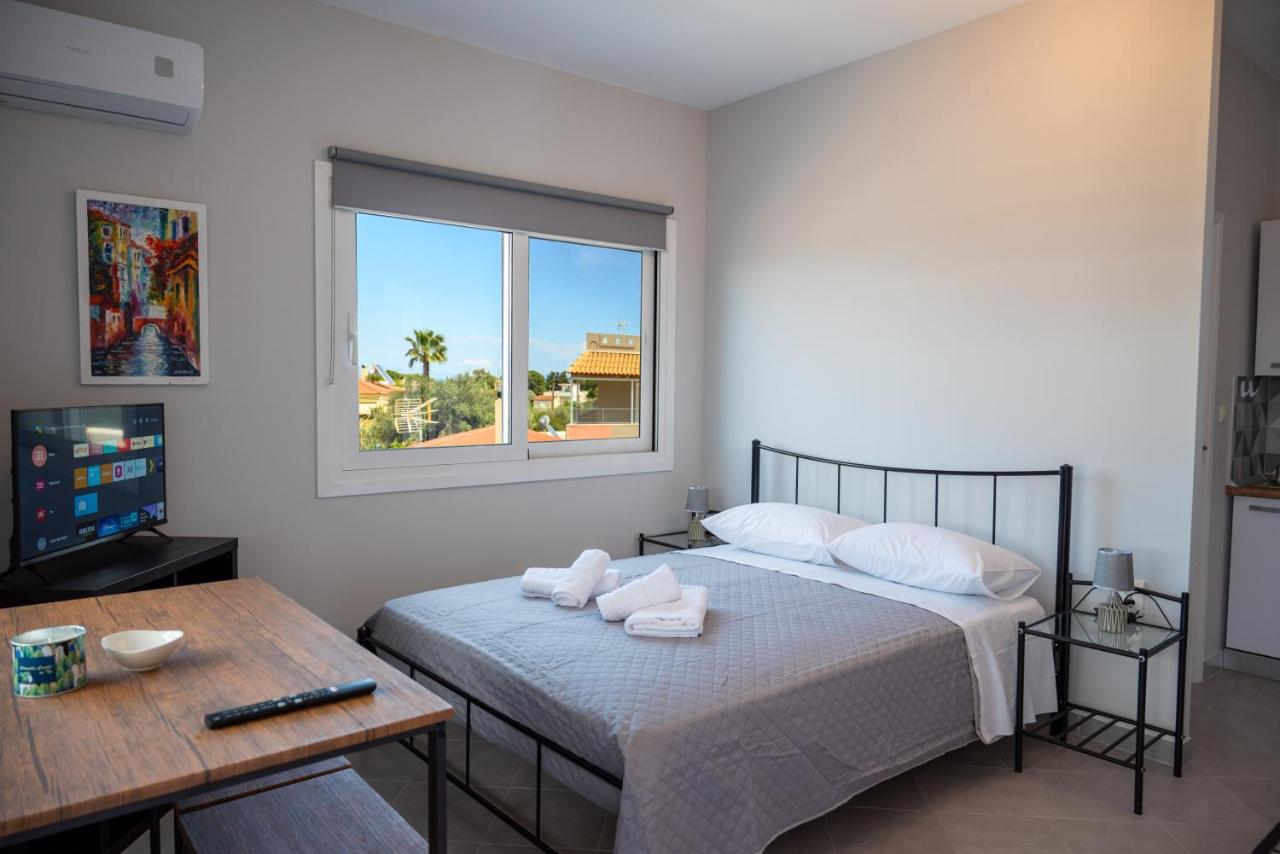 Airport Palmtree Apartments - 15min from Airport - Chambres d'hôtes Artémida