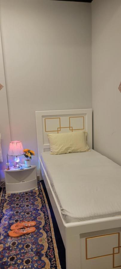 Habitación individual con aseo compartido