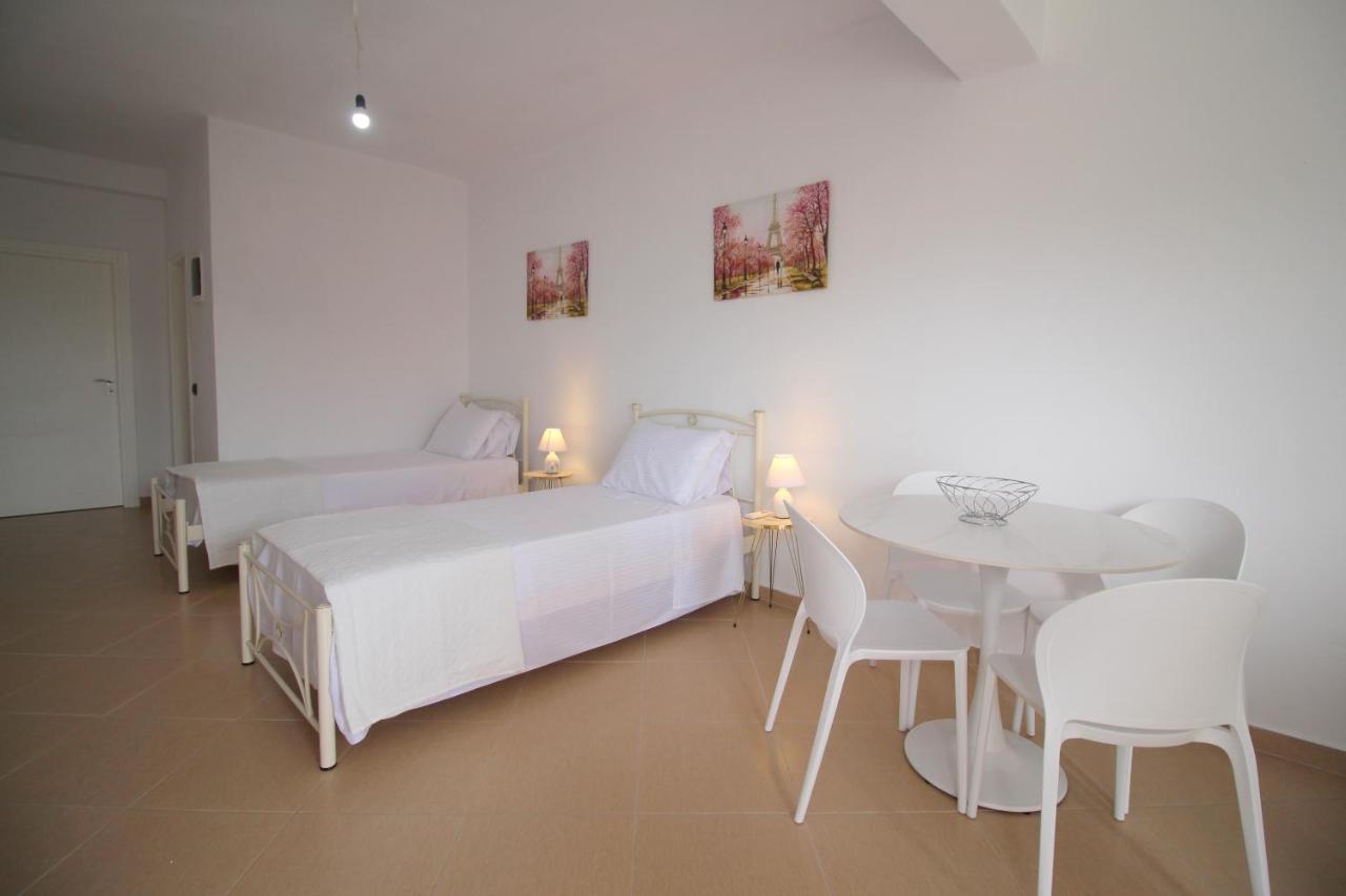 Quadruple Studio with Balcony and Side Sea View