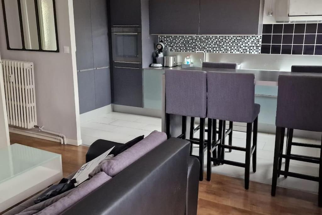 Refuge Urbain Chic avec Balcon - Ferienwohnung