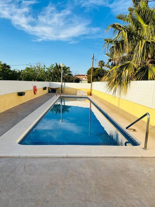 Adosado en la playa con piscina - B&B