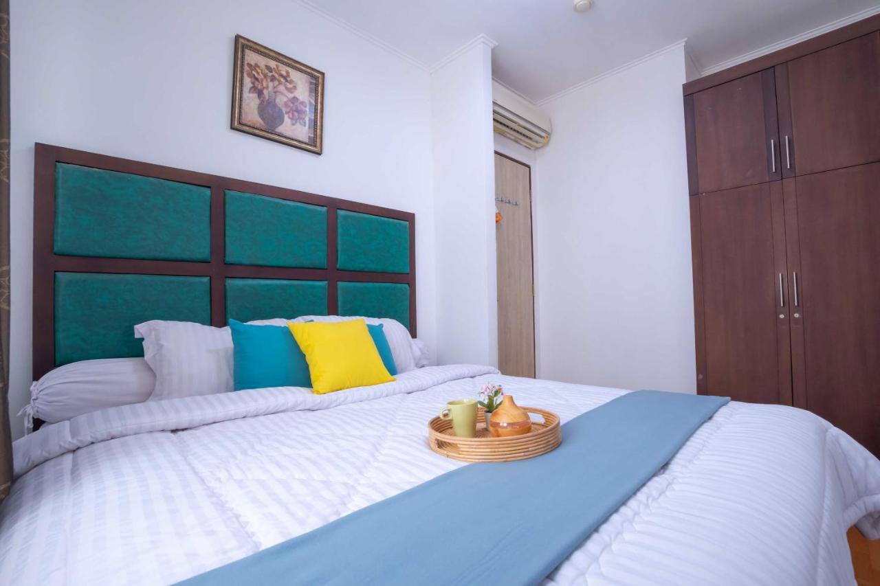 Two-Bedroom Apartment with Balcony