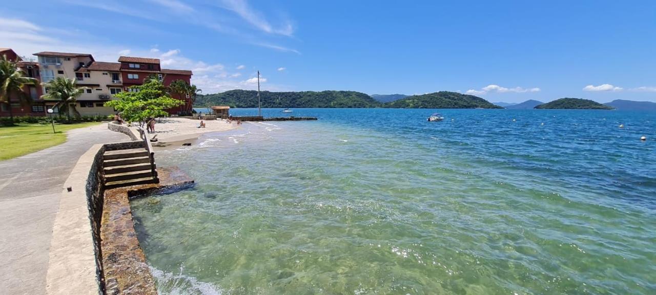 lindo apartamento frente ao mar pe na areia - B&B