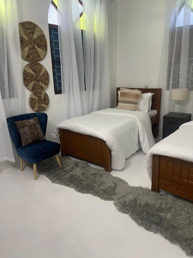 Tweepersoonskamer met 2 Aparte Bedden