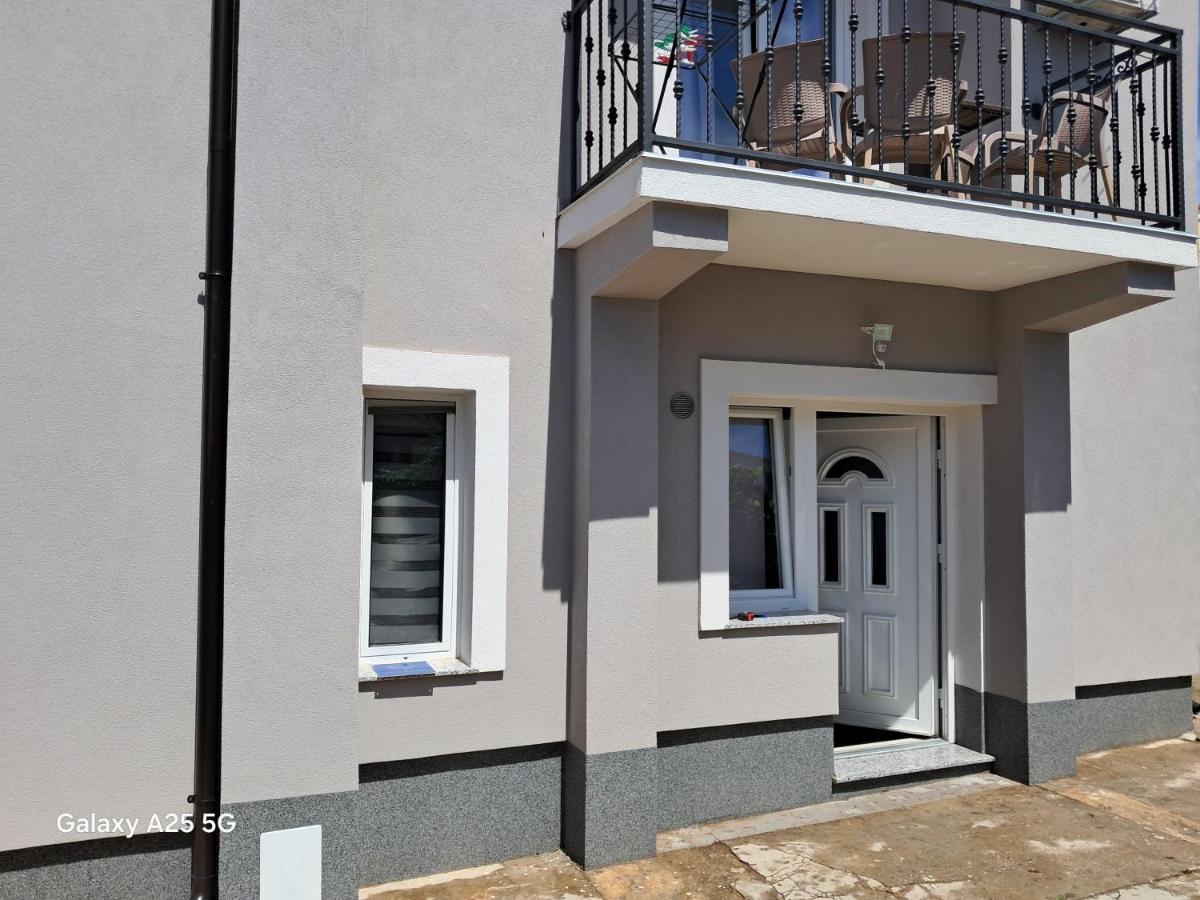 Three-Bedroom Apartment with Terrace and Sea View