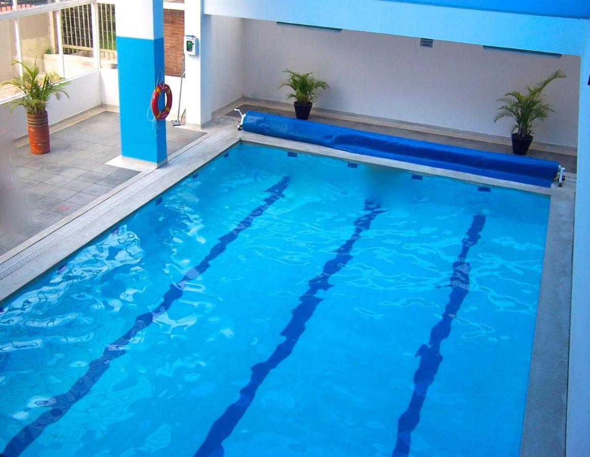 Apartamento 12 piso con piscina - B&B
