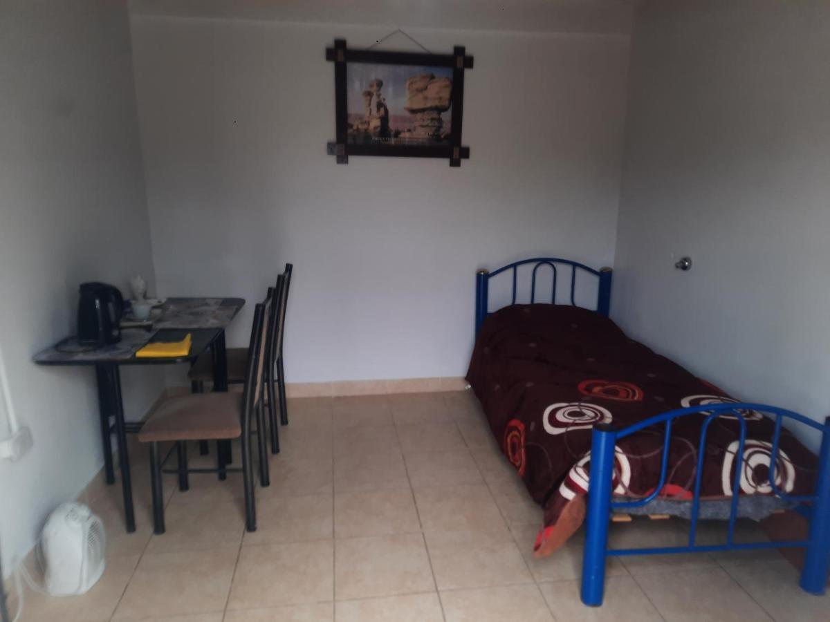 Single Bed in Dormitory Room