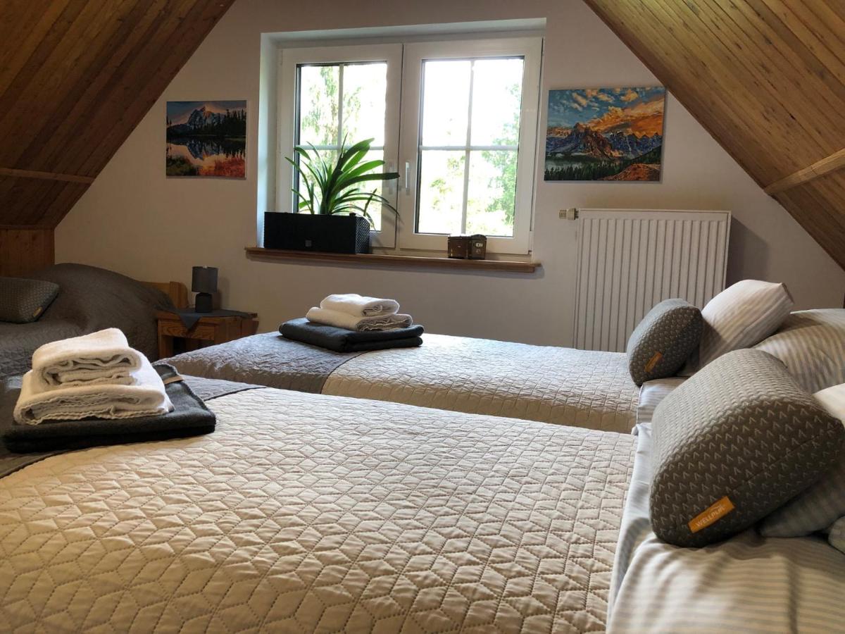 Dreibettzimmer mit Bergblick